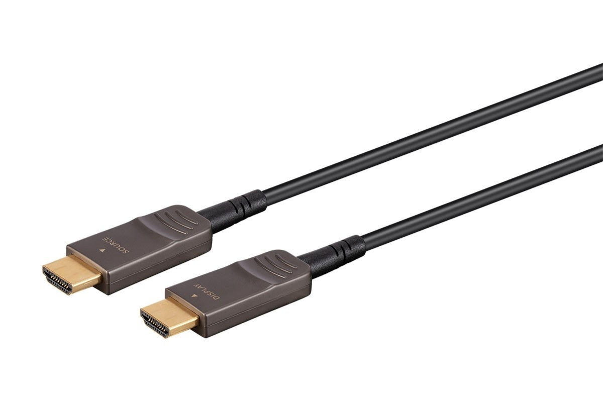 Close-up of two blue and yellow fiber optic cables with beige LC duplex connectors, designed for high-speed data transmission.